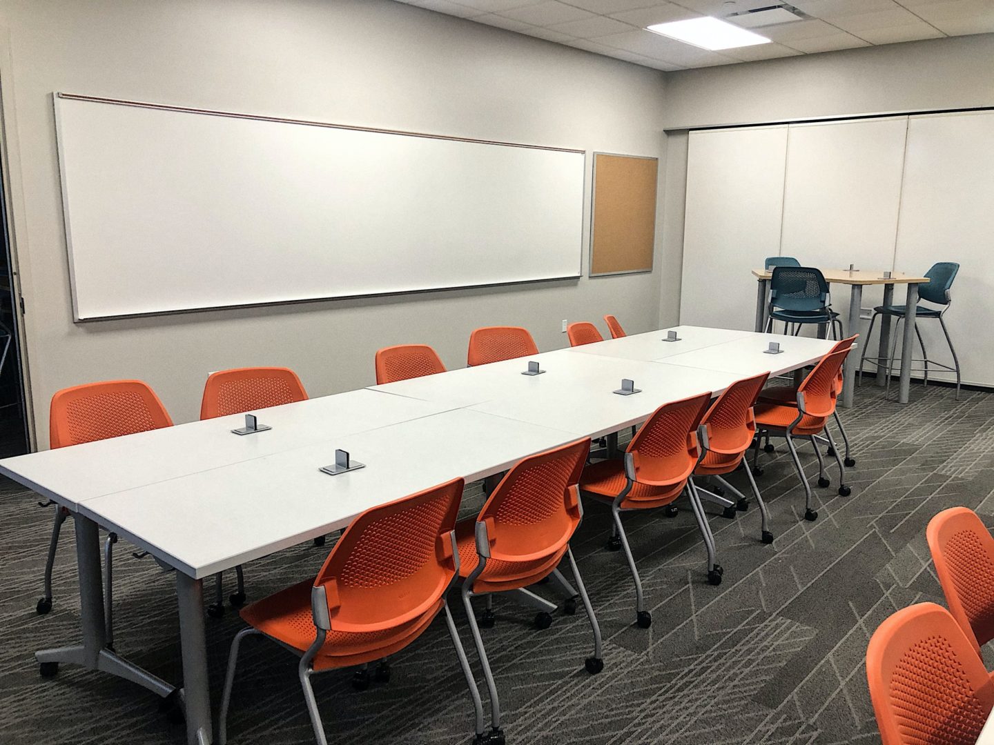 long table and chairs in a classroom